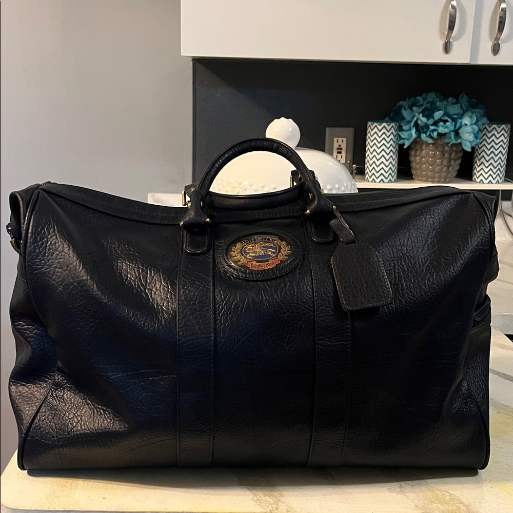 Burberrys Dark Navy Leather Bag with Embroidered Patch